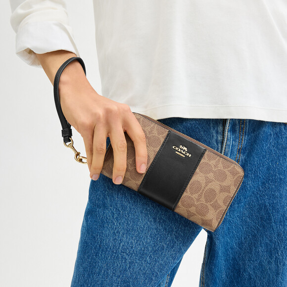 Coach Handbags - Coach Outlet Long Zip Around Wallet In Signature Canvas With Stripe